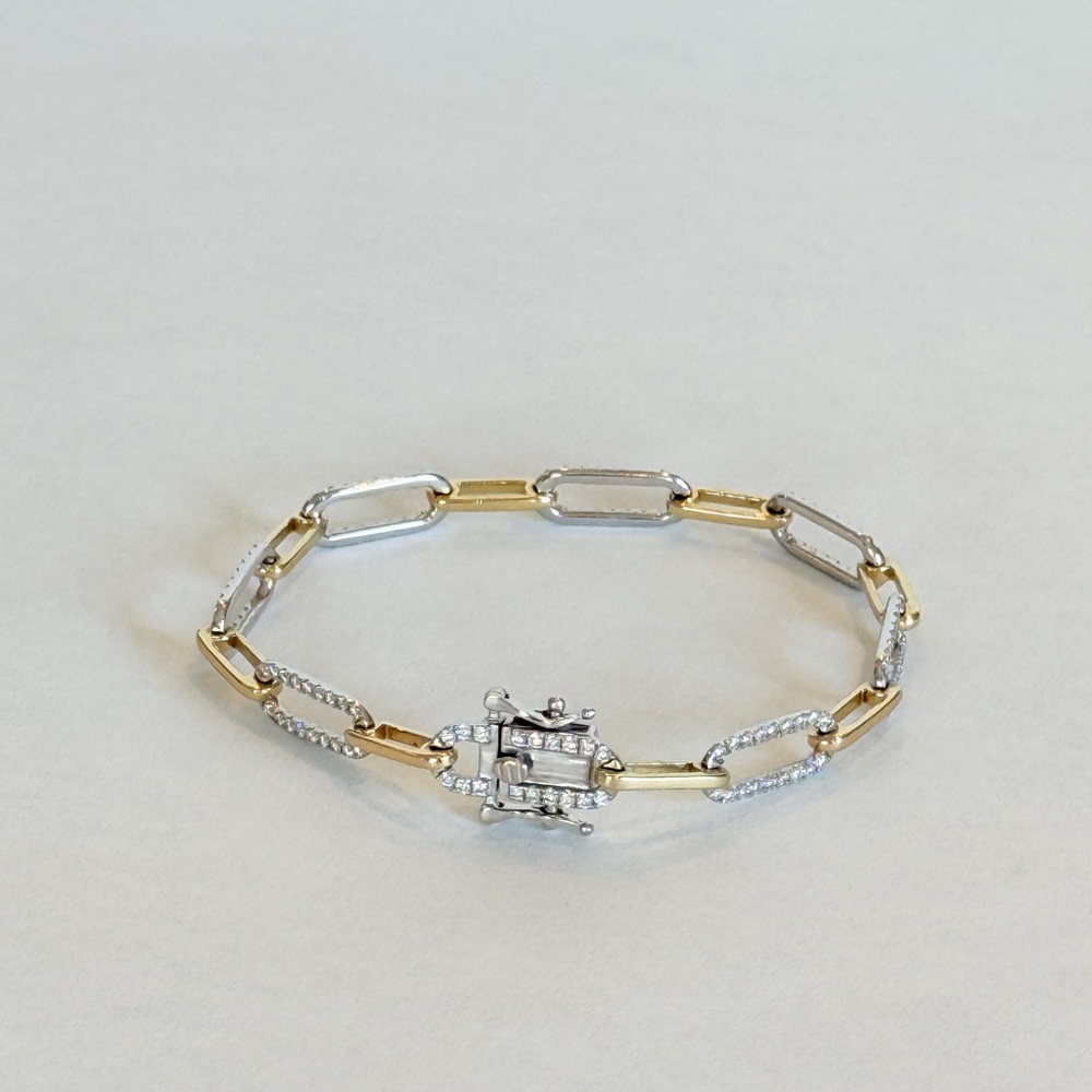 Elegant Gold 2 tone 14k lab diamond 7 inch length link bracelet is new. Amazing!